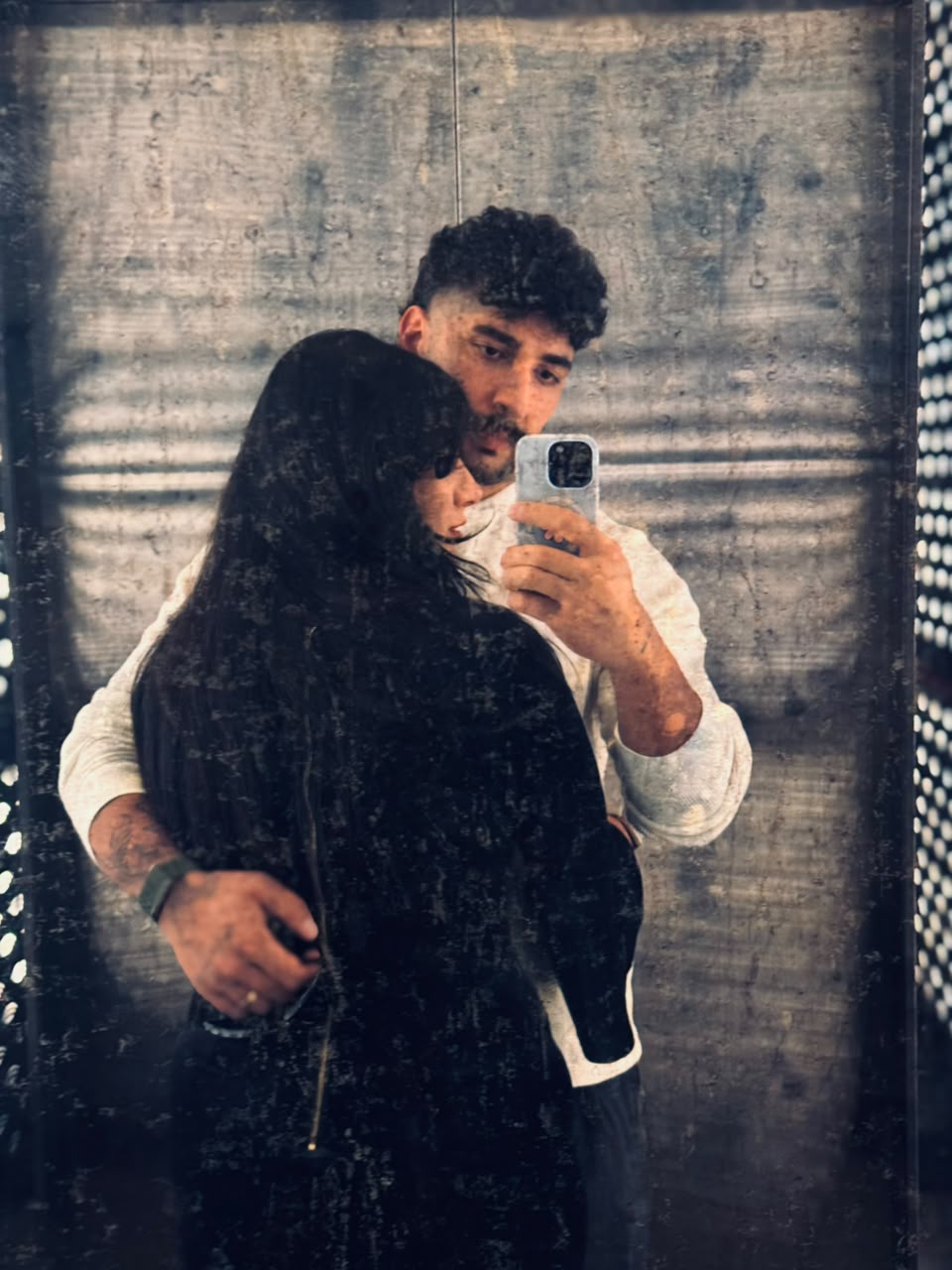 Sadaf and Arash moody mirror portrait